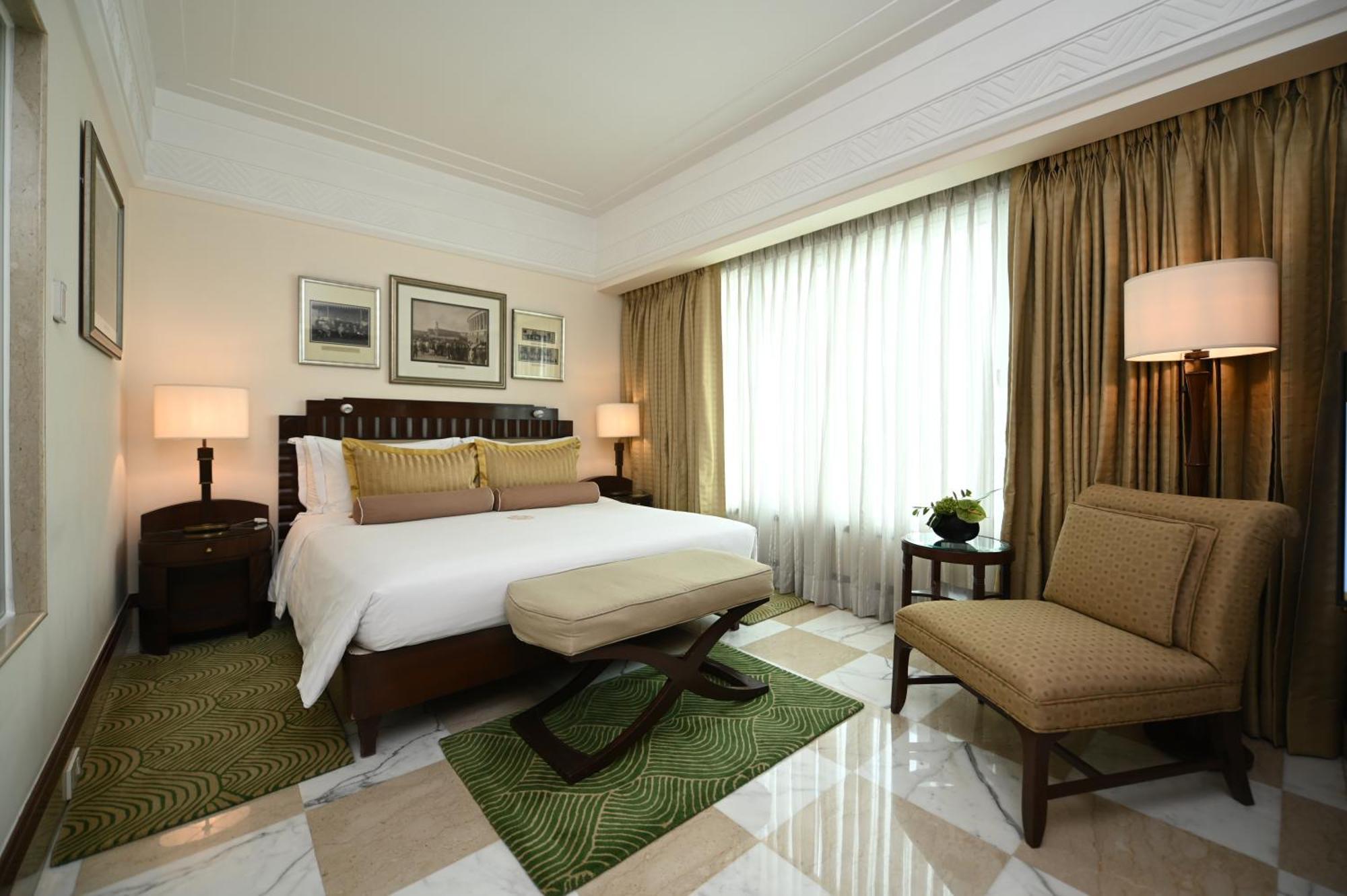 Hotel The Imperial, Nuova Delhi Esterno foto A bedroom at the Taj Mahal Palace
